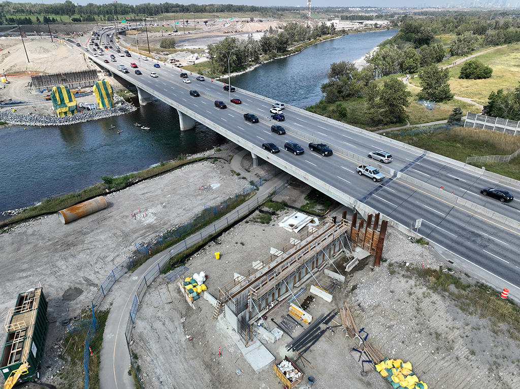 Looking northwest at abutments and in-river piers for the twinned Ivor Strong Bridge, August 18, 2024.